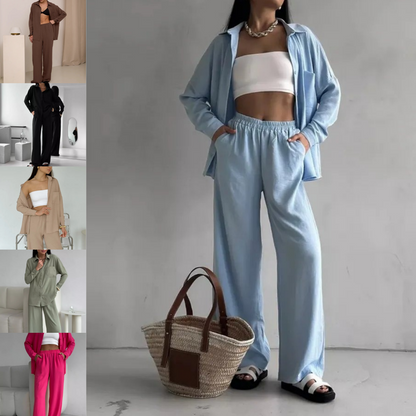 Elegant feminine set consisting of shirt and trousers