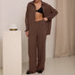 Elegant feminine set consisting of shirt and trousers