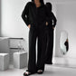 Elegant feminine set consisting of shirt and trousers
