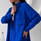 Elegant feminine set consisting of shirt and trousers