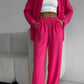 Elegant feminine set consisting of shirt and trousers