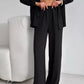Elegant feminine set consisting of shirt and trousers