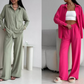 Elegant feminine set consisting of shirt and trousers